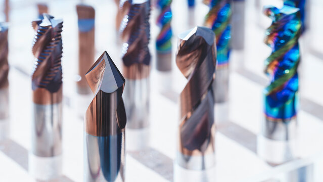 Industrial metalworking concept, milling cutter, metal cutter close up CNC cutters for metal. industry metal processing concept background