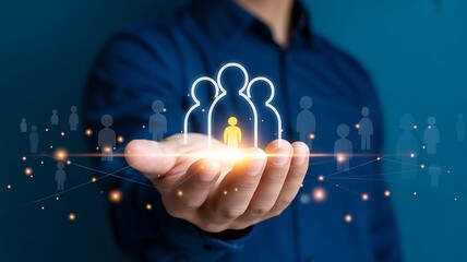 Businessman Open Hand Holding White Human Figures Representing Team Building and Human Capital Management