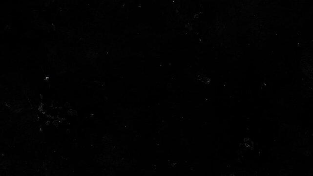 Dark grunge texture with purple dust particles black