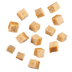 Crusty bread cubes floating on transparent background