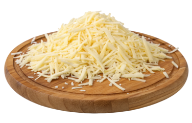 Shredded cheese on a wooden cutting board