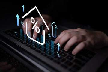 A focused shot of hands typing on a laptop, combined with graphical elements showcasing financial growth and analysis in a modern, digital workspace setting. Gantry