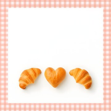 Heart-shaped bread and croissants on white background with pink gingham border. Cozy, romantic layout perfect for breakfast invitations, bakery promos, or Valentine-themed visuals.