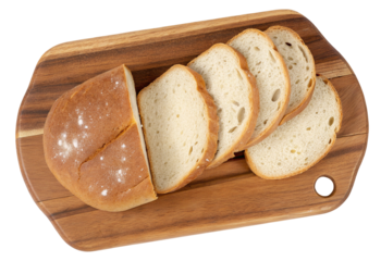 Freshly baked bread slices on a wooden cutting board