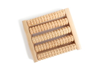 There is a wooden foot massager on a white background.