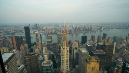 Stunning nighttime aerial panorama of Manhattan highlighting towers, streets, and vibrant lights