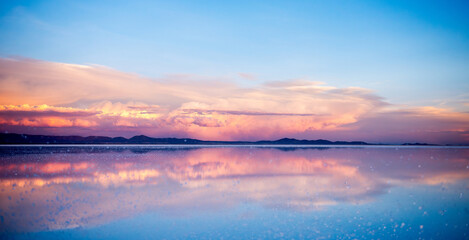 Reflective Landscape Of Salt Flats In Bolivia