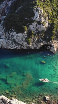 Porto Timoni beach, Agios Georgios, near Afionas village, beautiful Greek landscape, Corfu island, Greece, with turqoise water and sea beach, Kerkyra, Ionian sea islands, summer sunny day
