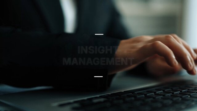 Professional business person typing on laptop in modern office environment focusing on insights and management strategy execution. Asymptotic smart data analytic. - Powered by Adobe