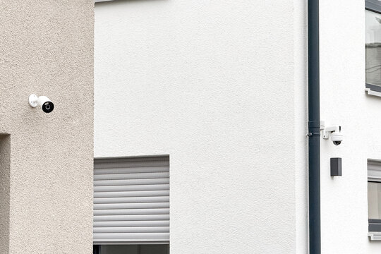 Modern House with Security Camera on Modern Facade