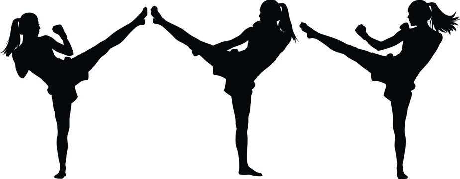 Silhouette of three women in high kick dance poses