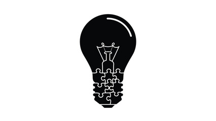 A black silhouette of a lightbulb composed of puzzle pieces