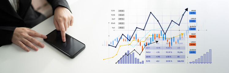 A professional analyzing financial trends on a smartphone, surrounded by detailed graphs and charts depicting market performance and growth in an office setting. Scalp