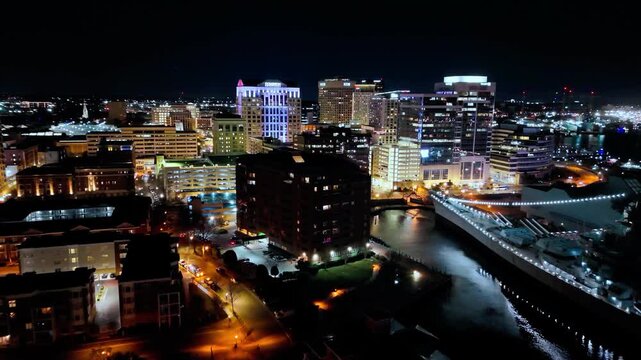 Aerial drone view of downtown Norfolk skyline at night, Virginia