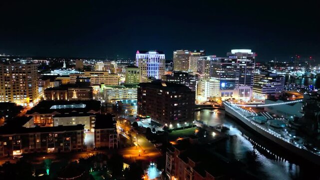 Aerial drone view of downtown Norfolk skyline at night, Virginia