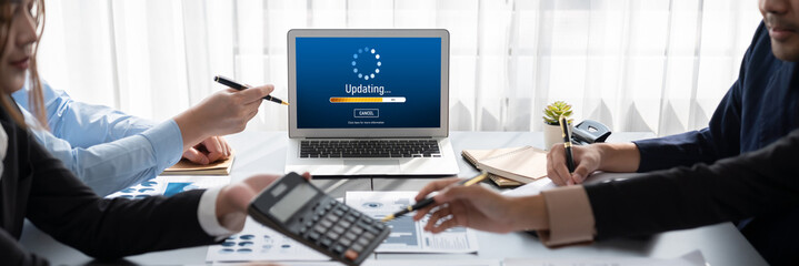 Business intelligence and data analysis concept. Analyst team working on financial data analysis dashboard on laptop screen as marketing indication for effective business strategic planning. Insight