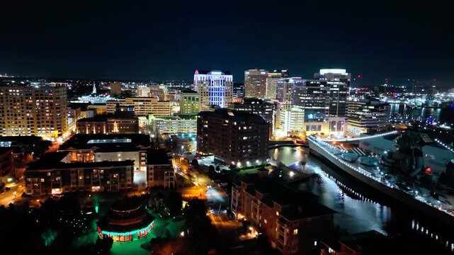 Aerial drone view of downtown Norfolk skyline at night, Virginia