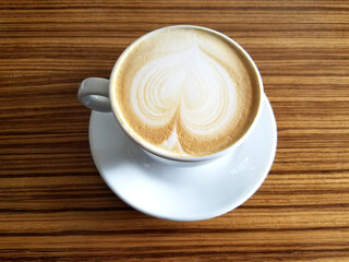 Top View of Cappuccino Coffee Cup on Wooden Table