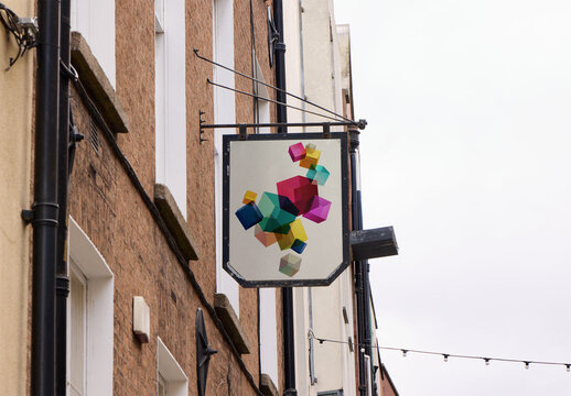 Mockup of blade Sign Hangs in Dublin Streets