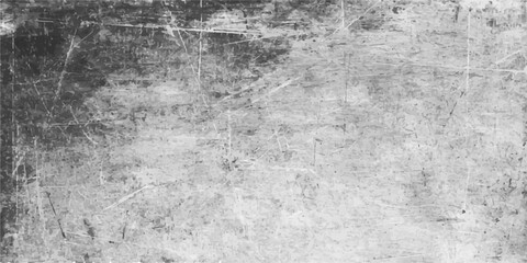 Obraz premium A vintage dark grey grunge wall texture background features a rough aged concrete surface with dirty paint splatters and a weathered stone pattern for an old industrial design backdrop