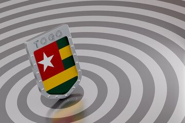 Naklejka premium Togo flag shield emblem on abstract circular background