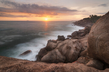 Stunning Sunset over Rocky Coastline in Unawatuna, Sri Lanka.