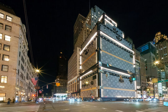 NEW YORK CITY - 16.September 2025, Large-scale experiential marketing installation by Louis Vuitton in New York City. A giant designer suitcase rises above the sidewalk.