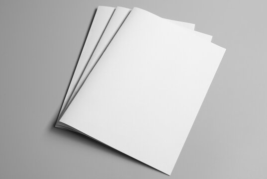 An open blank notebook page with a clean white paper sheet template provides empty space for a professional business document or magazine design illustration on a white background