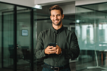 Smiling portrait latin Hispanic business manager using cell phone mobile looking at camera....
