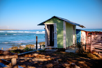 Rustic shacks and buildings along the shores outside of Puerto Plata in the Dominican Republic
