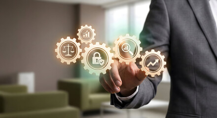 Businessman holding digital finance gear icons for growth and success in modern office