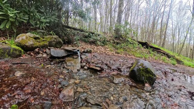 Source of Eagle Creek Pours Out of Piped Spring in the Appalachian Mountains