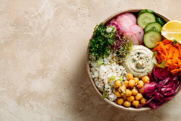 Colorful healthy nutrition meal prep poke bowl with fresh vegetables. Beautifully arranged and served on beige flat lay background.