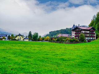 Fototapeta premium Charming Fuschl Village Houses with Flower Balconies