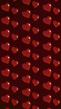 Animated pixel art hearts on a dark red background with recursive motion. This retro gaming style footage is perfect for Valentines Day themes or romantic social media posts.