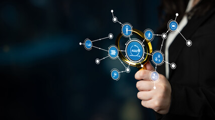 A businesswoman using a magnifying glass to explore various digital icons, symbolizing data analysis and innovation, reflecting a modern work environment. Tessel