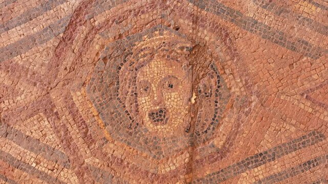 Ancient Roman Mosaic Floor with Human Figures - Detailed view of the ancient Roman mosaic floor from the archaeological site of the metropolis in western Turkey