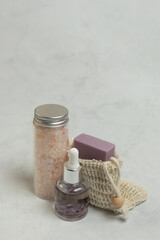 Arrangement of bath salts, body oil, and homemade soap