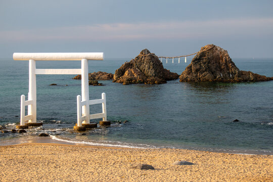Sakurai Futamigaura Torii Shrine and Couple Stones at sunset in November, Fukuoka, Itoshima