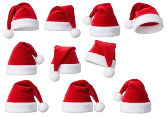 Multiple vibrant red plush Santa hats with white fluffy trim and pom-poms, arranged at various angles, isolated on a transparent background with copy space. Christmas holiday concept
