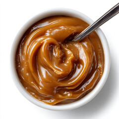 Bowl of Caramel Sauce with Spoon
