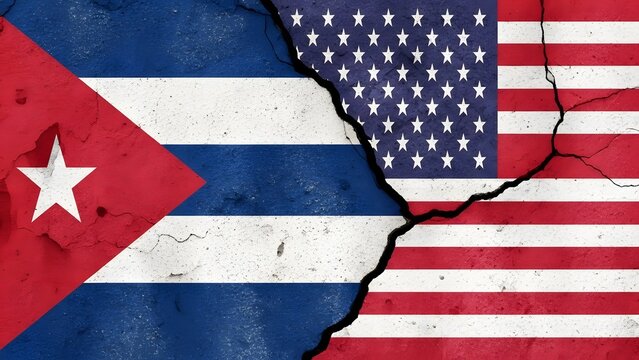 A cracked flag of Cuba and the United States symbolizing political division and strained international relations.