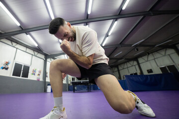 Athlete pushing limits during intense gym workout training