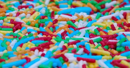 Bright Sprinkles Create Festive Scenes, Vivid Candy Sprinkles Spread Over Lively Celebration Surfaces