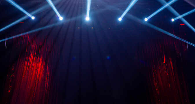 abstract concert background with red curtains and spotlights