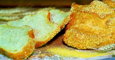 Detailed View Of Golden Toasted Bread Showing Textured Crust And Tender Inner Crumb Dusted With Flour
