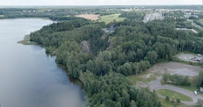 Aerial view of old T&ouml;rm&auml; open pit mine in cloudy summer weather, Lohja, Finland.