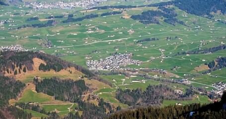 Sunny Mountain Village, Idyllic Mountainous Hamlet Surrounded By Rolling Fields And Dense Forested Ridges