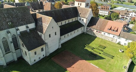 Suspended Aerial Perspective Of Ancient Abbey Grounds Featuring Wellmaintained Lawns And Protective Arches