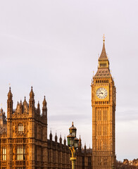 Elizabeth tower, popularly known as Big Ben, standing tall next to the Houses of Parliament in...